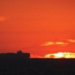 silhouette sunset container ship