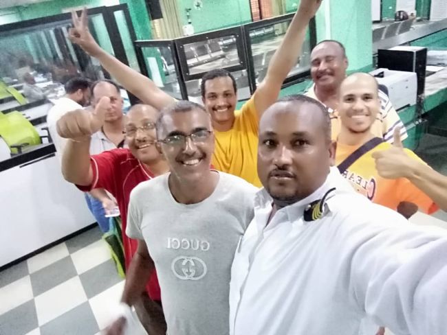 The crew of the MV Nader at the bank in Port Sudan City where they finally received their unpaid wages. | SOURCE: ITF