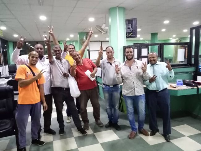 The crew of the MV Nader at the bank in Port Sudan City where they finally received their unpaid wages. | SOURCE: ITF