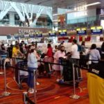 Filipino repatriates checking in for the Scoot TR 1390 flight for Manila last 27 July. Photo _ Raul Macapinlac