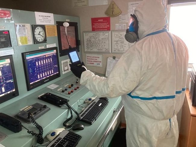 Specialist DisinfectYour.com team members on board a vessel