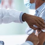 covid vaccine injecting