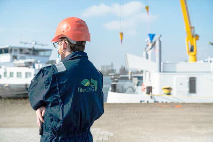 Crew member attends the COVID-secure christening ceremony