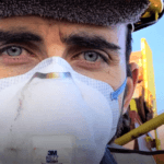 Seafarer wearing PPE kit during COVID 19 pandemic onboard