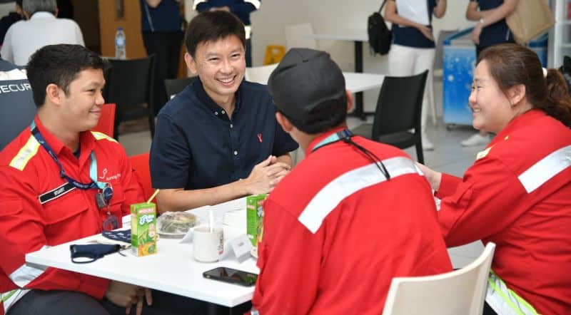 Senior Minister of State for Transport and Foreign Affairs, Mr Chee Hong Tat, speaking to frontliners from Jurong Port