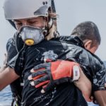 Rescuer carrying a child