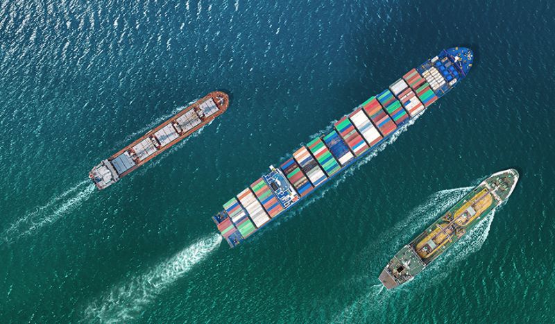 container ships sailing top down view