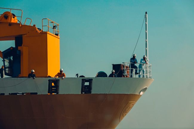 Ship front with crew members