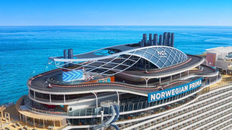 The Prima Speedway will be the largest and first ever three-level racetrack, spanning a quarter mile in length (1,378 feet/ 402 meters), wrapping around the ship’s funnel and featuring 14 nail-biting turns