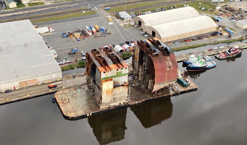Loaded with Sections Three and Six of the Golden Ray wreck, the Barge Julie B continues sea fastening on Friday at Mayor’s Point Terminal in preparation to transit the sections to Louisiana. St. Simons Sound Incident response photo.