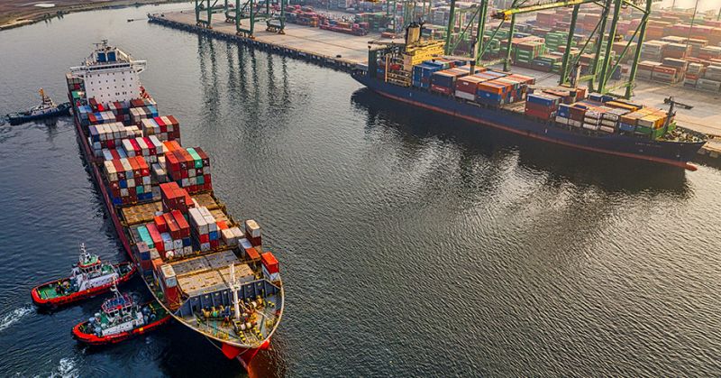 Large container ship arriving in port.