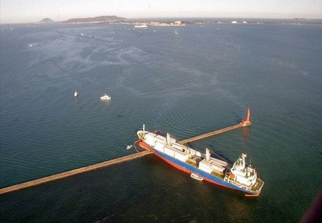 A cargo vessel is seen after it collided with a breakwater. - Photo courtesy of the Fukuoka Coast Guard Office