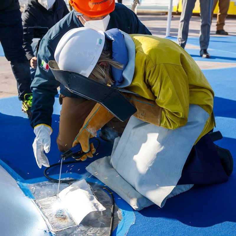 welding a piece of steel