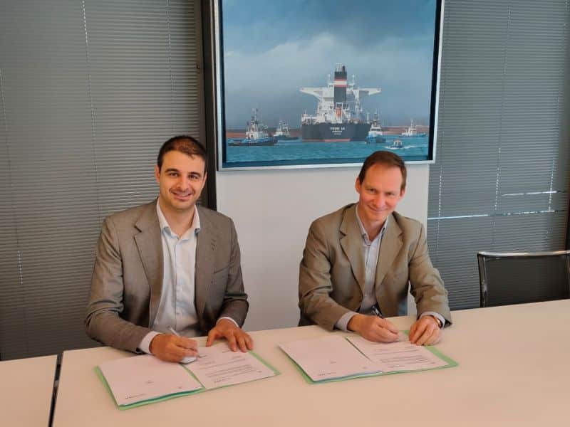 CEOs signing the deal
