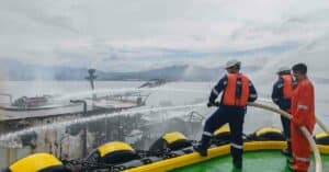One Dead in Motor Tanker Fire, 63 Rescued from Passenger Ship