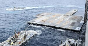 US Navy Anchors Temporary Pier For Humanitarian Aid Delivery To Gaza