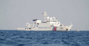 China Seizes & Unfurls Flag On A Disputed Reef In South China Sea, Philippines Responds