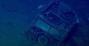 Researchers Stunned After Finding Mysterious Car Inside WWII Aircraft Carrier Wreck
