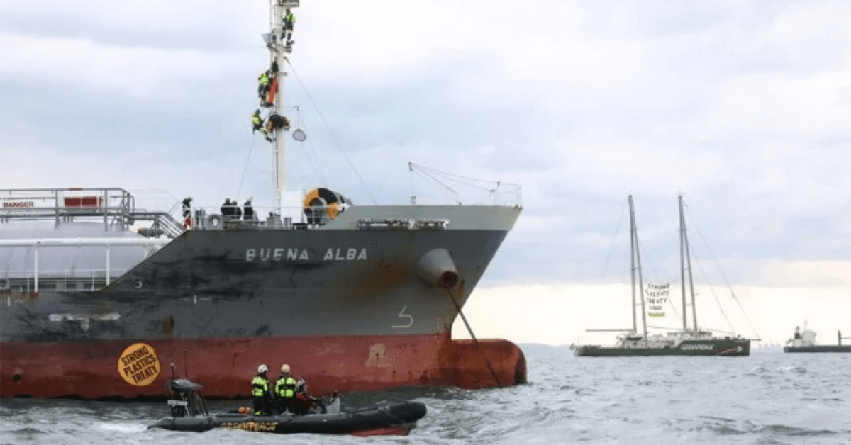 Greenpeace activists boarding tanker