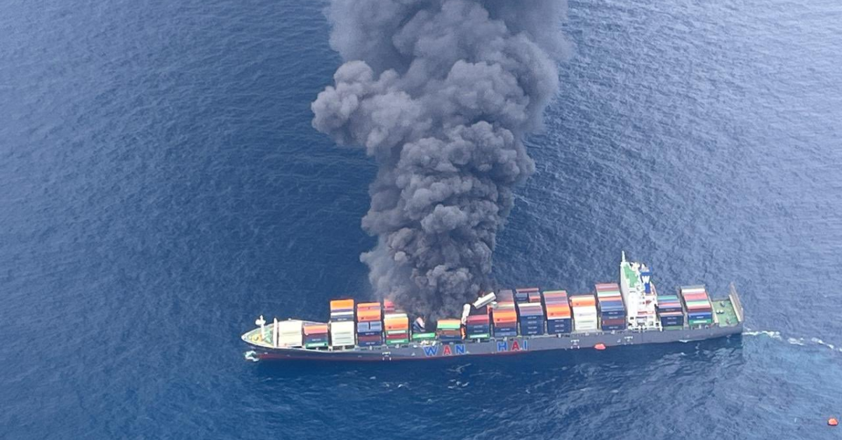 container ship burning