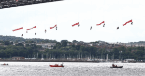 Watch: Protesters Hang From Iconic Forth Bridge To Block Gas Tanker For 24 Hours