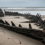 Historic 16th Century Cargo Ship Hull Washes Ashore After Powerful Gales Hit Norfolk Coast